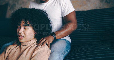 Buy stock photo Woman, relax and shoulder with massage in home for bonding, pamper or valentines day on sofa. Female person, man or couple with treatment on couch for anniversary gift, date or stress relief in house