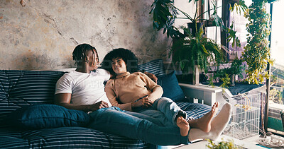 Buy stock photo Home, relax and couple in lounge, discussion and bonding together with romance. Happiness, man and woman on sofa, marriage or trust with afternoon break, relationship or talking with love or support