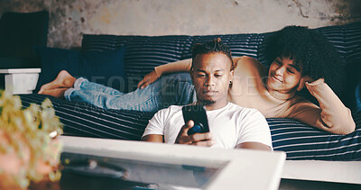 Buy stock photo Happy, couple or relax with phone in home for watching online videos, social media or weekend break. Love, african people and chill with smartphone on sofa for streaming app, bonding and relationship