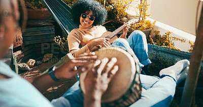 Buy stock photo Outdoor, drum or happy woman with guitar on hammock, playing musical instrument or bonding on balcony. Song practice, sunglasses or people with hobby in home, acoustic musician or chilling on weekend