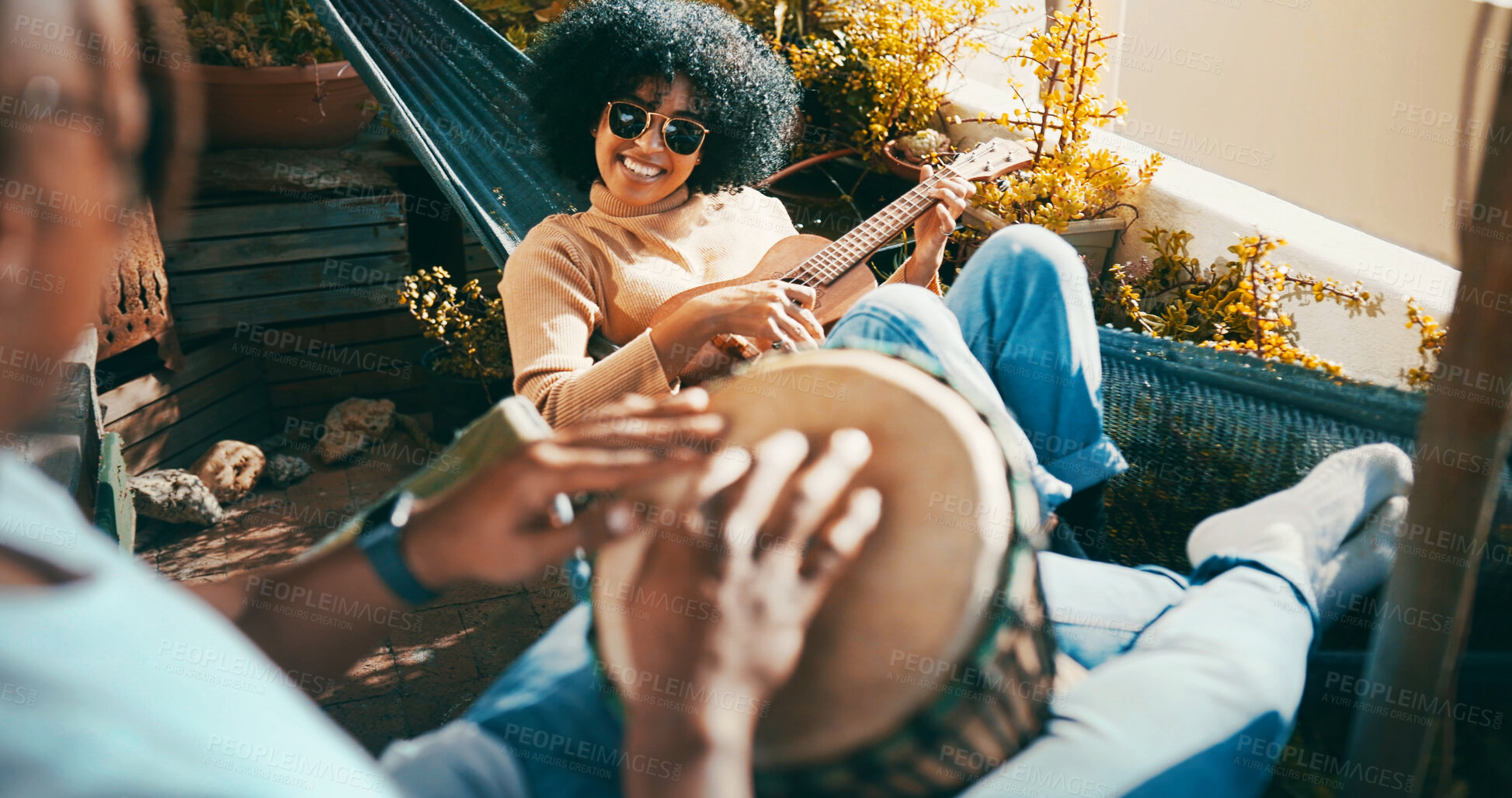 Buy stock photo Outdoor, drum or happy woman with guitar on hammock, playing musical instrument or bonding on balcony. Song practice, sunglasses or people with hobby in home, acoustic musician or chilling on weekend