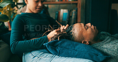 Buy stock photo Relax, plaiting and woman with man for hairstyle with bonding, connection or love in home. Grooming, marriage and couple together for playing with dreadlocks on sofa in living room for calm in house.