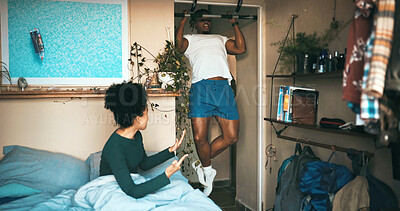 Buy stock photo Fitness, pull up and man with woman in home for workout, training or arm strength in morning. Motivation, active and couple in bedroom for relax and exercise with talking, counting or marriage.