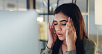 Woman, headache and burnout in office with computer, fatigue and tension from journalism problem. Tired, person and migraine in workplace with desktop, creative block and pressure for online article.