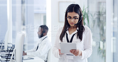 Buy stock photo Telecom, woman and reading in call center with tablet, client support and troubleshooting response. Person, coworking or email in office with tech for customer service, consultant advice or feedback.
