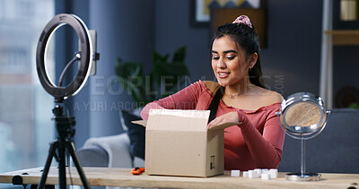 Buy stock photo Girl, influencer and unboxing with ring light, happy or review product with live streaming on web in home. Person, content creator and excited with package, recording or mobile app for social network