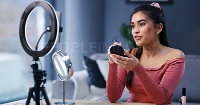 Buy stock photo Ring light, woman and influencer with makeup brush for live streaming, beauty or tutorial. Cosmetics, foundation and person recording video on phone for aesthetic, glow and broadcast guide in home