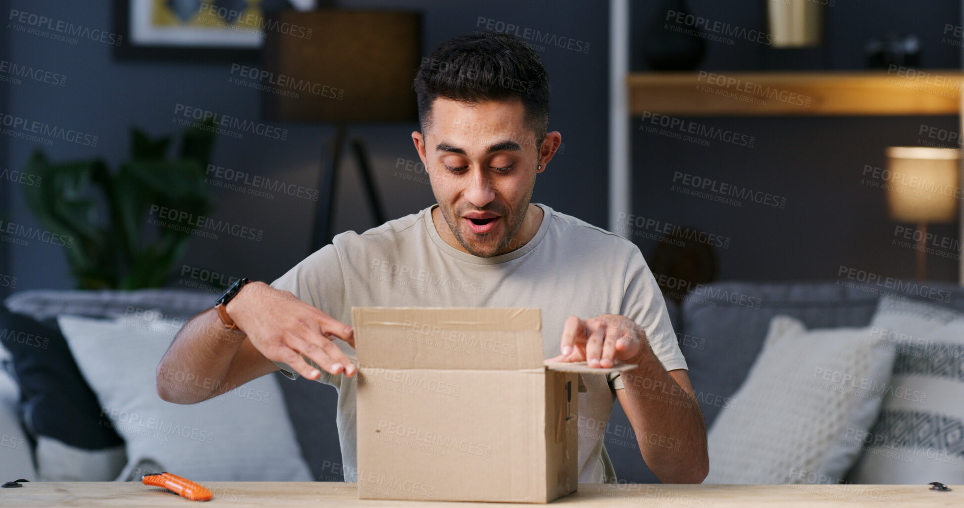 Buy stock photo Surprise, delivery or happy man with box for gift, package and smile or shock for courier service in home. Unboxing, wow and person excited with mail, parcel or cargo for present in living room