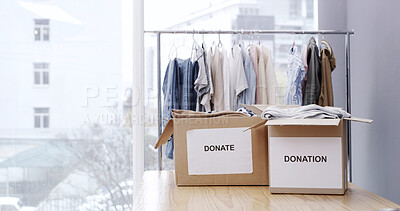 Buy stock photo Donation box, charity and empty with clothes for nonprofit and cardboard container. Sign, donating and community center with care, spring cleaning and support with NGO project and storage with offer