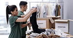 Happy couple, packing and boxes with clothing donation for charity, welfare or giveaway in home. Man, woman or volunteer with smile, package or donate for community service, humanitarian aid or house