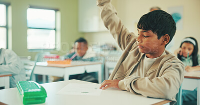 Buy stock photo Studying, raised hands and question with boy in classroom for student opinion, quiz discussion and attention. Course guidance, help and problem solving solution with children in school for lesson