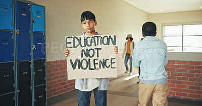 Buy stock photo Portrait, school and boy with sign, protest and education with placard, teenager and protection. Anti bullying, student and child in hallway, activism or banner to promote safety, study and awareness