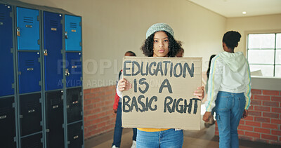 Buy stock photo Portrait, school and girl with sign, protest and education with placard, studying and empowerment. Learning, student and child in hallway, basic rights and banner to change curriculum and knowledge