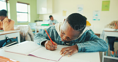 Buy stock photo Classroom, child and writing notes in book for learning, maths lesson and practice sums for education. Calculation solution, kids or boy with problem solving in school, concentration or study numbers