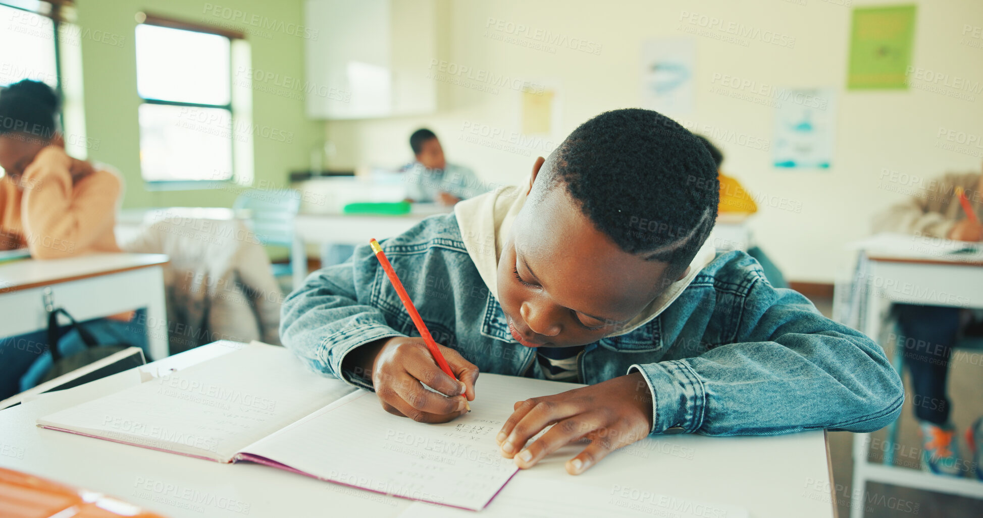 Buy stock photo Classroom, child and writing notes in book for learning, maths lesson and practice sums for education. Calculation solution, kids or boy with problem solving in school, concentration or study numbers