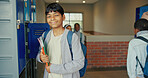 Smile, education and portrait of boy at lockers for future, child development and knowledge. Studying, growth and academy with student in school campus for learning, course curriculum and books