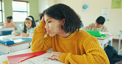 Buy stock photo Bored, child and thinking in classroom with books for biology activity, learning and skill development. Tired, girl or kids in school with contemplation for academic project, science course or study.