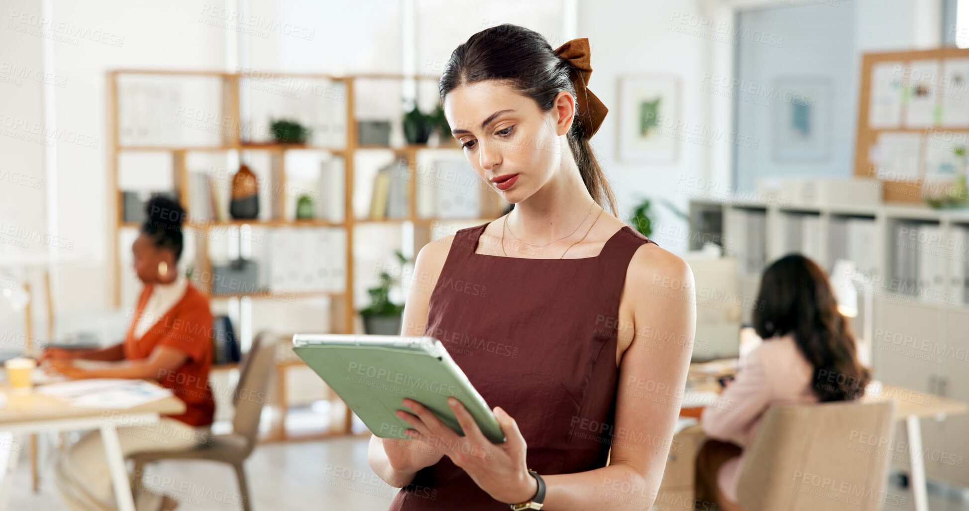 Buy stock photo Business woman, tablet and reading in office for creative agency, editing or manuscript. Coworking, employee or editor in workplace with internet, tech and email for proofreading or grammar on app
