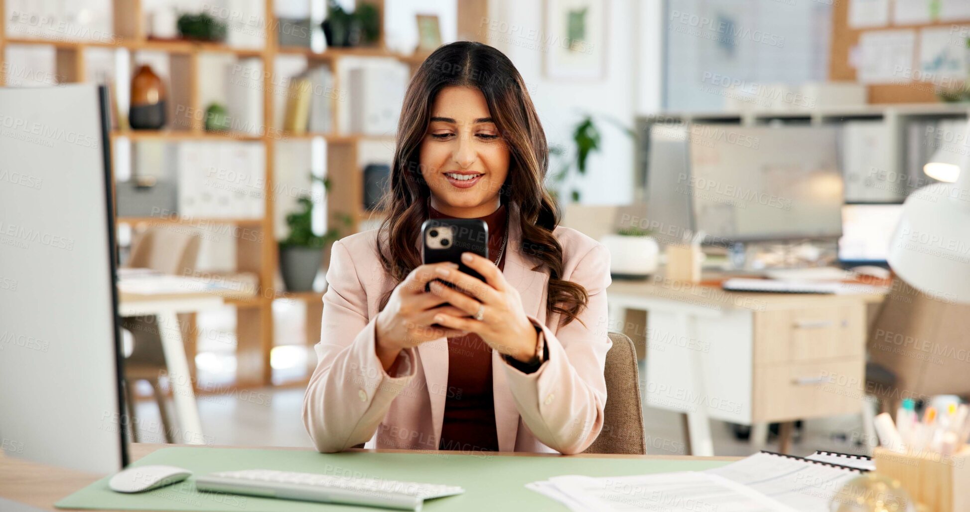 Buy stock photo Woman, typing or smile in office with phone for digital advertising, social media campaign or update. Person, browse or reading in workplace with tech for online marketing, mobile app post or review.