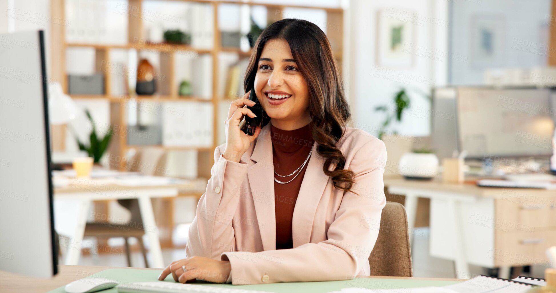 Buy stock photo Media agency, phone call and woman in office, smile and online interview with communication. Person, employee and journalist in workplace, smartphone or internet with digital app, chatting or talking