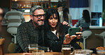 Selfie, love and couple in pub, happiness and bonding together with alcohol, relax and profile picture. People, men and woman with internet, relationship or celebration with memory and photography