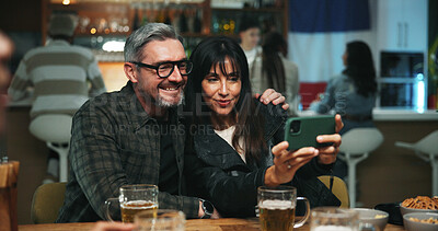Buy stock photo Selfie, love and couple in pub, happiness or bonding together with alcohol, relax or profile picture. People, men or mature woman with internet, relationship or celebration with memory or photography