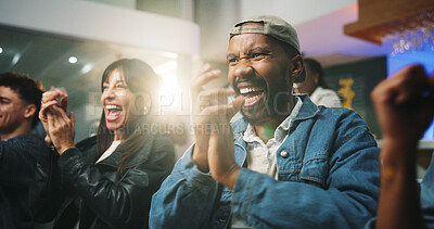 Buy stock photo People, applause and celebration at sports bar, watching tv or happy for goal in soccer competition. Group, friends and excited with flare, football match or broadcast for international game at pub