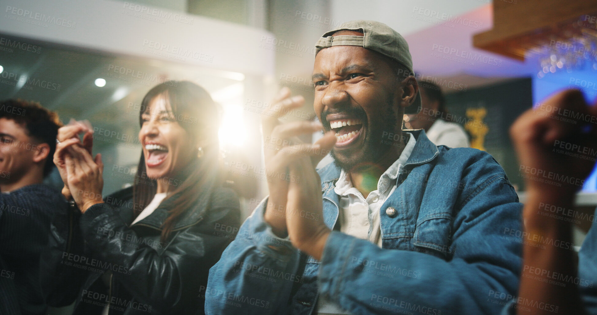 Buy stock photo People, applause and celebration at sports bar, watching tv or happy for goal in soccer competition. Group, friends and excited with flare, football match or broadcast for international game at pub