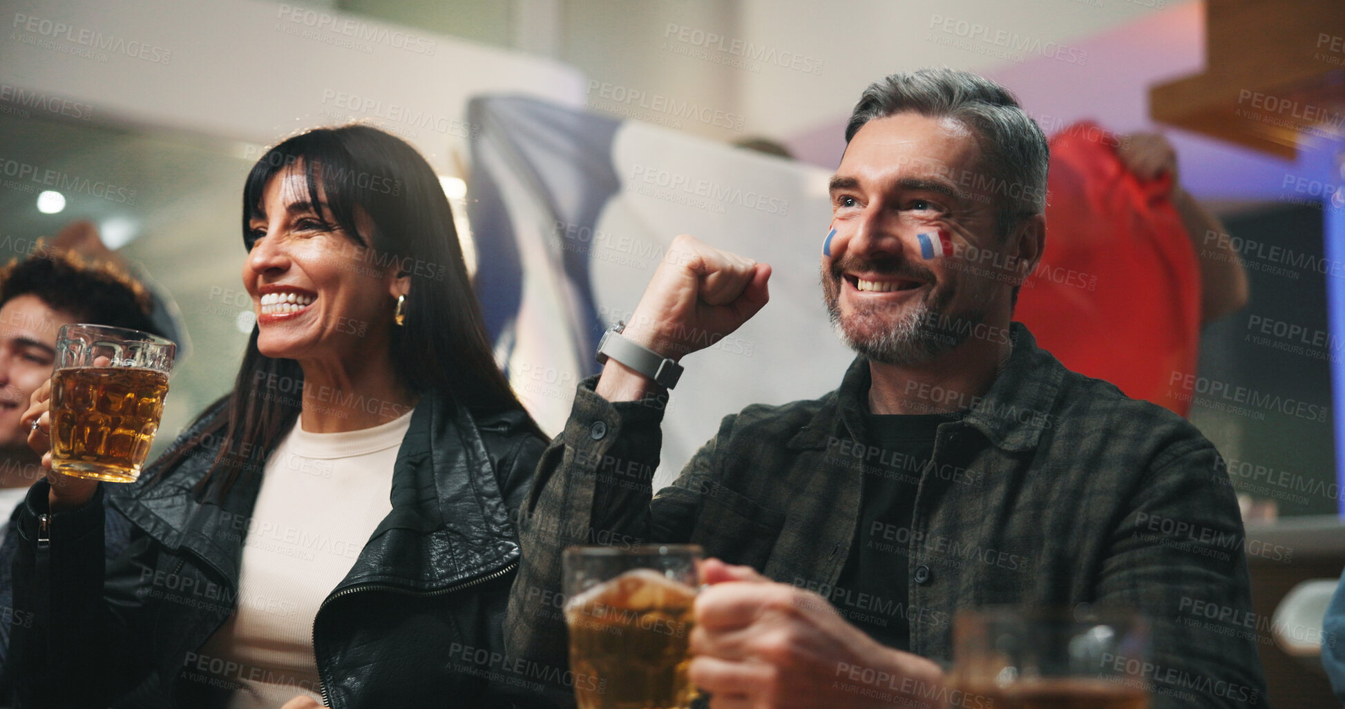 Buy stock photo Man, beer and watching tv with celebration at sports bar, football or competition with France flag. Mature people, group and fist pump with soccer game, live stream or broadcast with drinks at pub