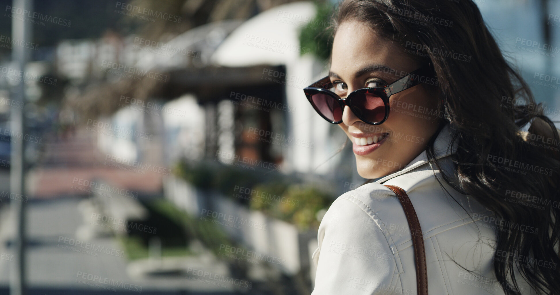 Buy stock photo Smile, travel and sunglasses with portrait of woman in city for confidence, trip and vacation. Happiness, pride and eyewear style with person walking outdoor for holiday, relax and positive attitude