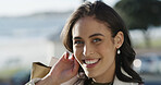 Portrait, shopping bags and woman in city, smile and confidence with retail therapy. Consumer, outdoor and happy person with purchase, boutique promotion and discount deal with sale or carrying gifts
