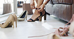 Woman, hands or tying with high heels for shoe shopping, footwear or fashion style in boutique. Female person, shopper or feet with tie or strap for fitting or change in retail clothing store or shop