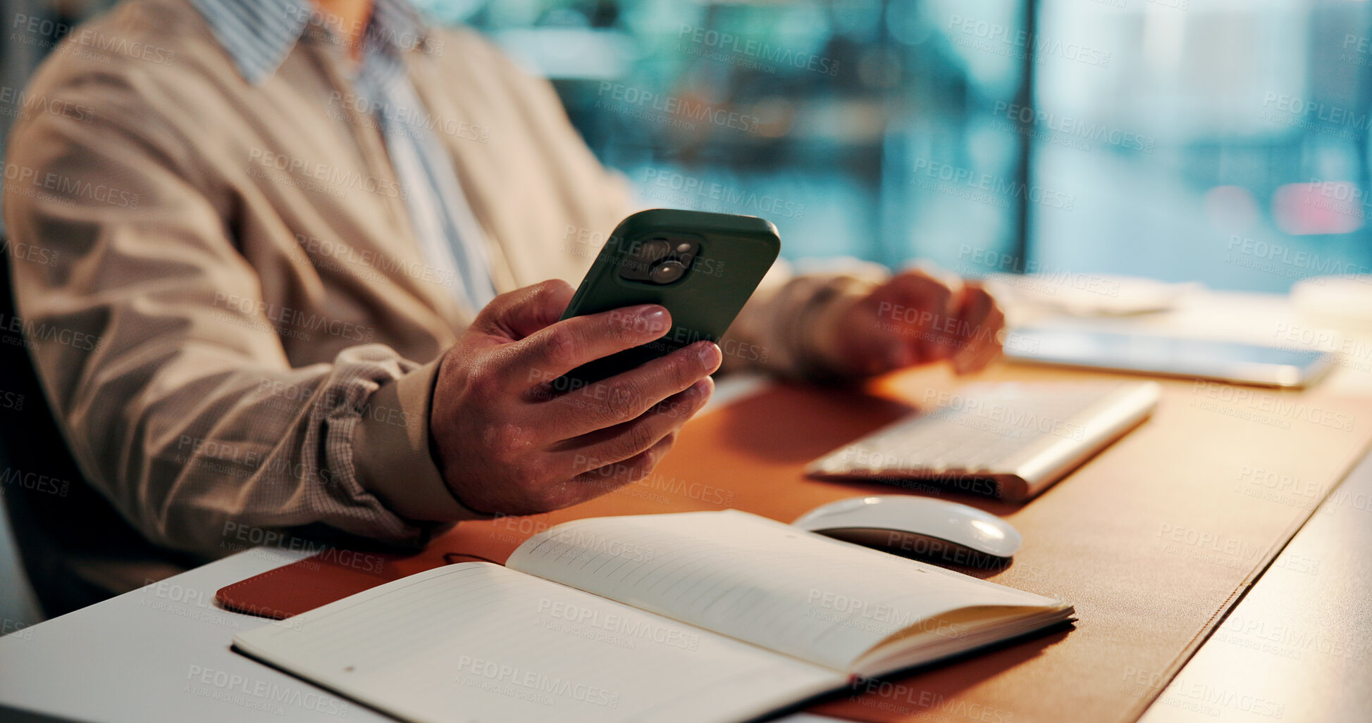 Buy stock photo Business man, office or hands with mobile, check time or waiting for client feedback at night. Deadline pressure, overtime or investor expect notification for update, project status email or phone