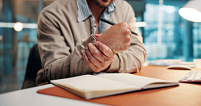 Buy stock photo Wrist pain, strain or hands in office with notebook, burnout or joint inflammation in carpal tunnel. Ache, man and employee in agency with writing, muscle tendinitis or arthritis in overwork.