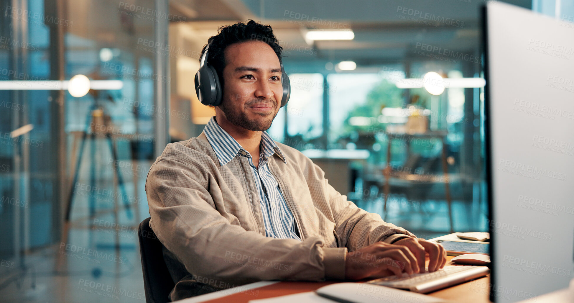 Buy stock photo Headphones, typing and happy businessman with computer for music, copywriting or research. Audio, technology and content writer in workplace for streaming radio, editing article and info in office