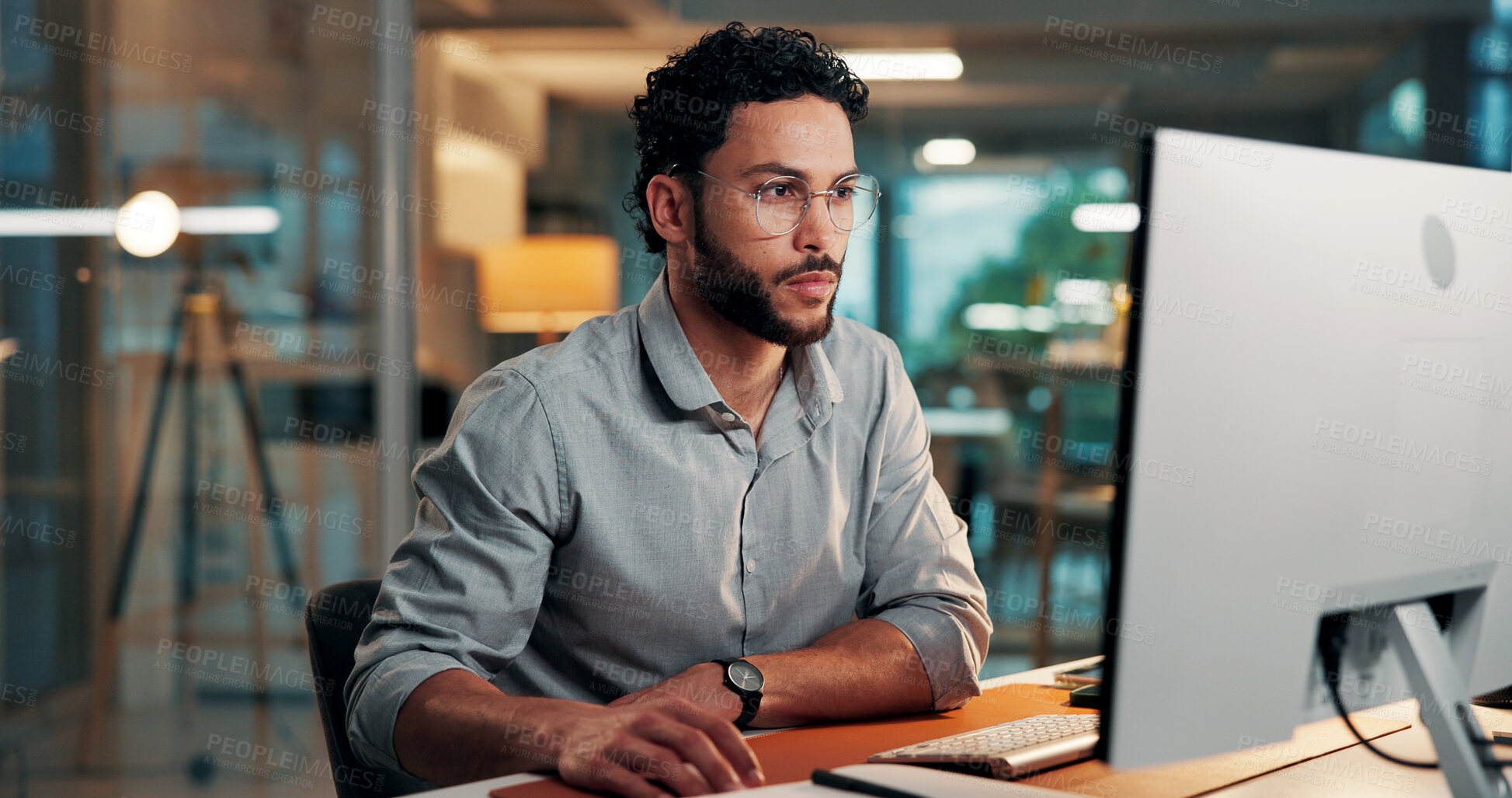Buy stock photo Research, reading and man with computer in office for creative project with online article. Glasses, feedback and male magazine editor with communication or review for publishing on technology