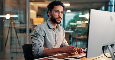 Buy stock photo Serious, employee and man with computer, office or reporter with article on web, typing and creative. Online, research and person with tech for story, journalist and prepare for magazine publication