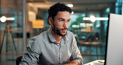 Buy stock photo Research, feedback and man with computer in office for creative project, evening and online article. Glasses, reading and magazine editor with deadline, overtime or review for publishing on tech