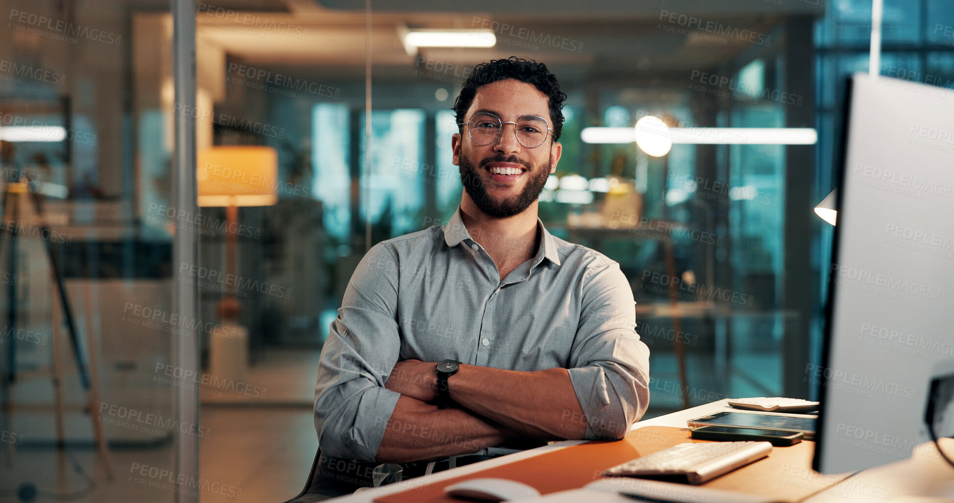 Buy stock photo Arms crossed, portrait and smile of designer man at desk in office for complete task or satisfaction. About us, confident and creative with happy employee in design workplace for online development