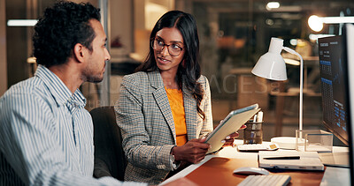 Buy stock photo Night, talking and business people on tablet for finance review, investment and budget planning. Meeting, working late and man with woman on tech for financial report, research and proposal in office