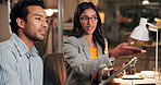 Discussion, computer and business people in office at night with deadline for finance report. Collaboration, overtime and team of financial advisors with planning for investment proposal in workplace