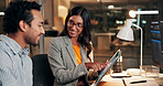 Night, meeting and business people on computer for finance review, investment and budget planning. Dark, working late and man with woman on tech for financial report, research and proposal in office