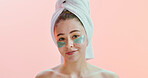 Portrait, skincare or woman with eye patches in studio, reduce dark circles or self care treatment. Hydration benefits, smile or person with glow mask for dermatology, mockup space or pink background