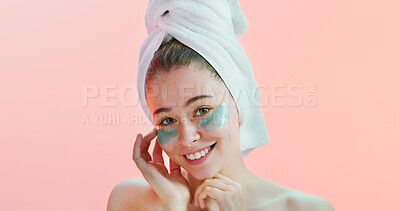 Buy stock photo Portrait, dermatology or happy woman with eye patches in studio, reduce dark circles or mockup space. Smile, hydration or person with facial mask for skincare, self care treatment or pink background