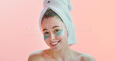 Buy stock photo Portrait, dermatology or happy woman with eye mask in studio, reduce dark circles or mockup space. Smile, wellness or person with hydration patch for skincare, self care treatment or pink background