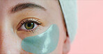Portrait, skincare or eye with mask in studio, reduce dark circles or hydration treatment for wellness. Space, anti aging benefits or woman with patch for dermatology, self care or pink background