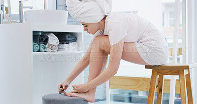 Buy stock photo Woman, nail polish and relax in bathroom with feet for beauty routine, grooming and getting ready. Person, pedicure or foot treatment in apartment with color for painting toes, wellness or self care.