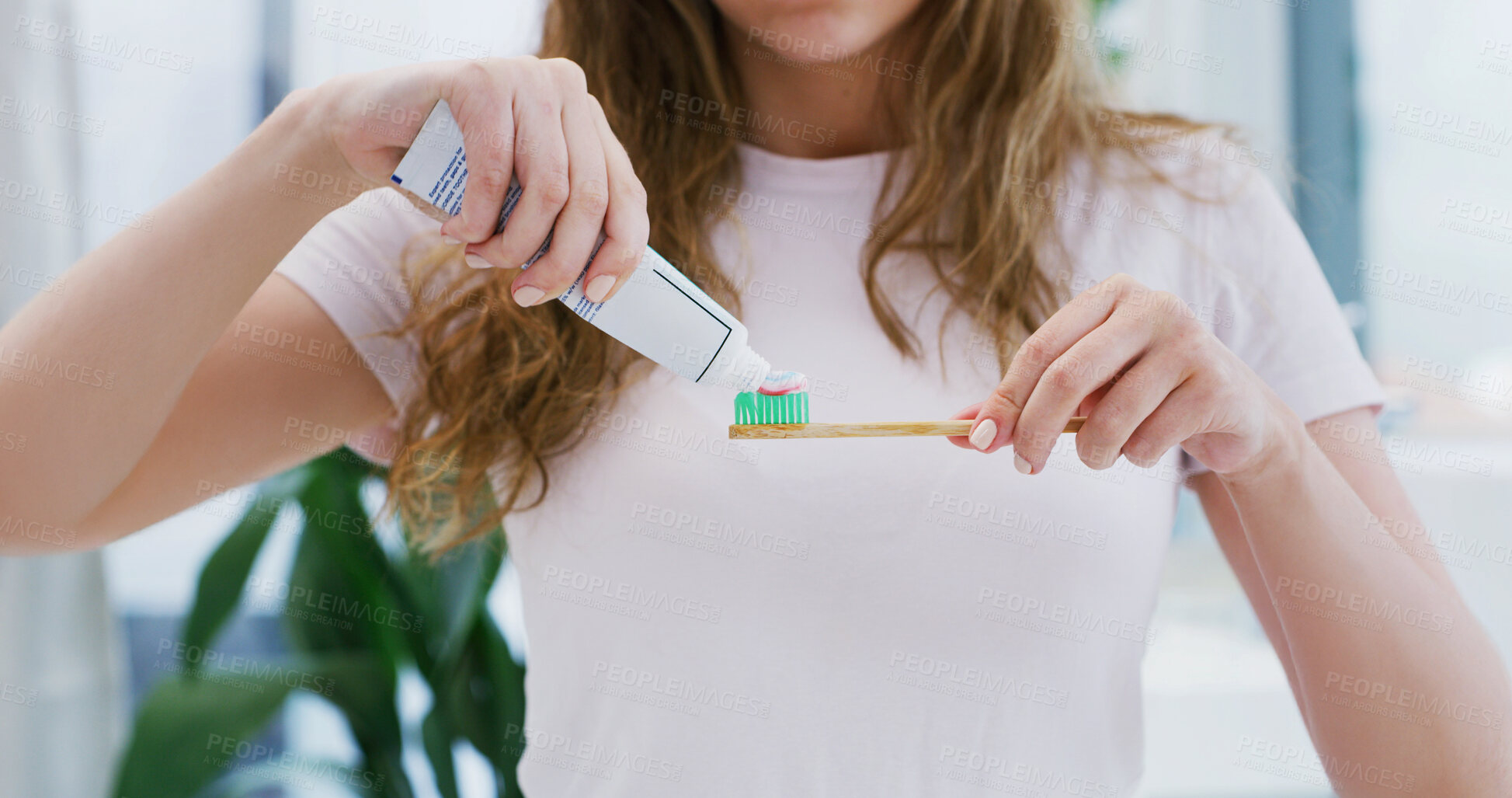 Buy stock photo Woman, hands and toothbrush in bathroom with toothpaste for morning routine, dental hygiene or wellness. Female person, brushing teeth and getting ready in home for oral care, clean and fresh breath.