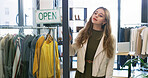 Small business, sale and woman with clothes, open sign or outfit in designer boutique or thrift store. Entrepreneur, wait and retail owner for service, deal or startup with quality fabric at mall
