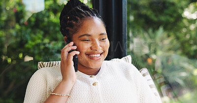 Buy stock photo Phone call, relax and smile with black woman in home living room for chatting or conversation. Communication, mobile and thinking with happy African person in apartment sunroom for break or contact
